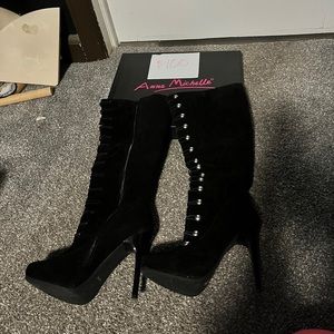 Knee high boots. Never wear them.  7.5 shoe size